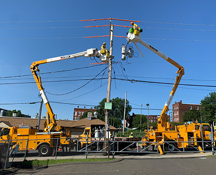 Line crews repairing overhead line