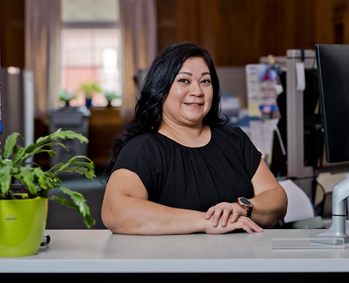 Customer Service representative ready to assist at HG&E. 